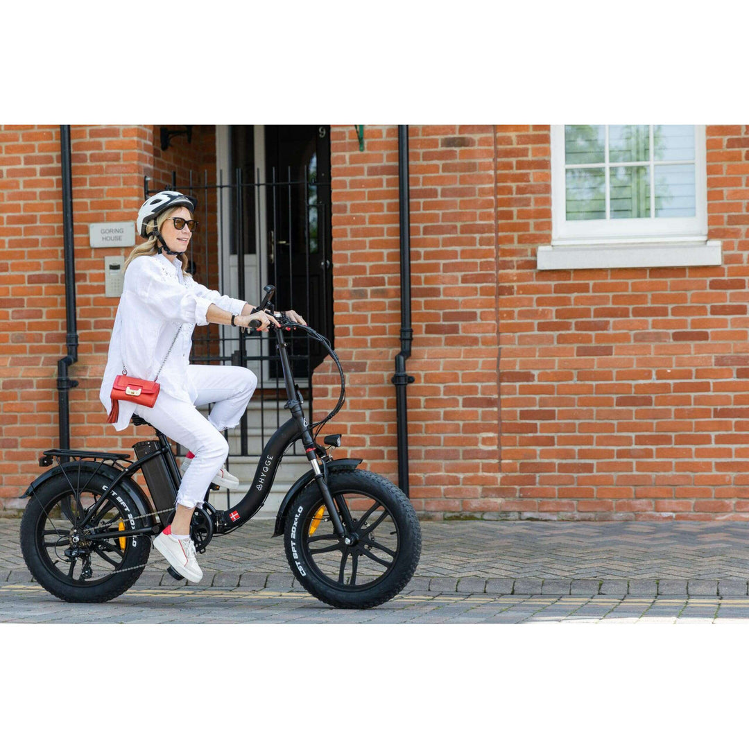 Hygge Vester Step electric bike being ridden by woman in streets